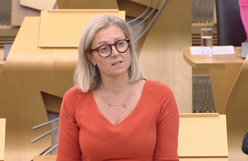 Photo of Rachael in the Scottish Parliament Chamber 