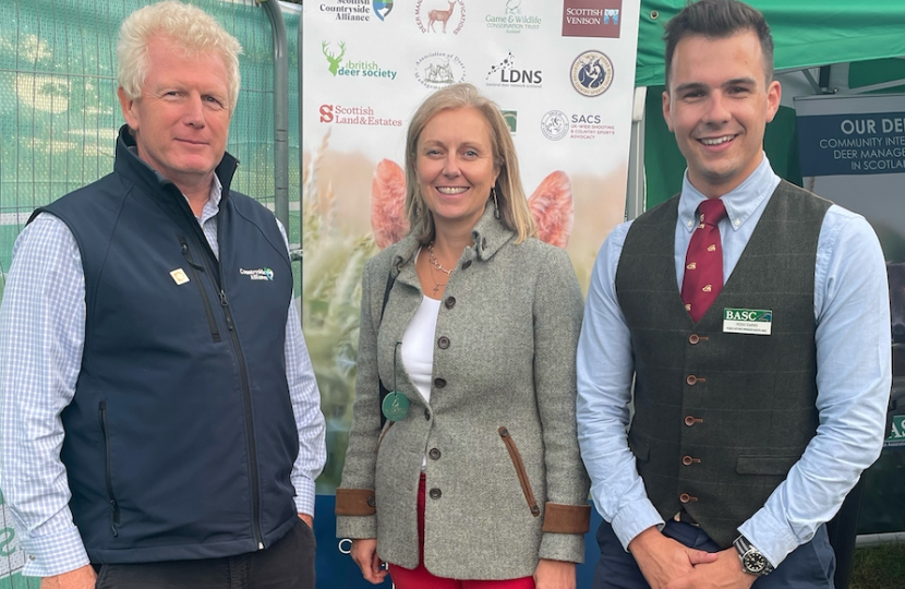 Photo of Rachael Hamilton MSP, with Ross Ewing (BASC Scotland) and Tim Bonner (Countryside Alliance) at the launch at the BASC Reception, GWCT Game Fair, Scone.